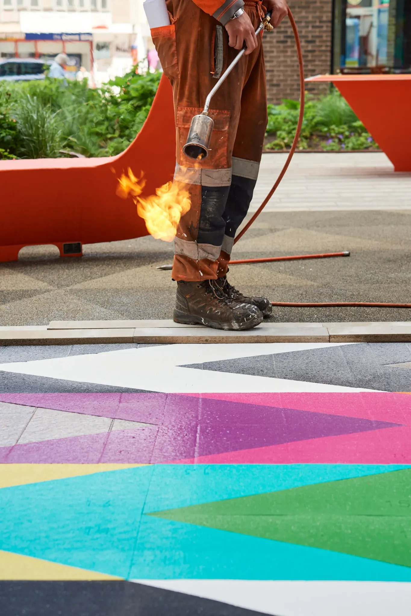 Heat application during installation of the Intersection artwork